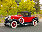 AUT 18 RK0751 01
1929 Franklin Convertible Coupe Red 3/4 Front View On Pavement By Trees