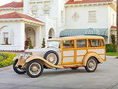 AUT 18 RK0759 01
1929 Rolls-Royce 20 HP Station Wagon Cream 3/4 Front View On Pavement By Building