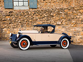 AUT 18 RK0775 01
1925 Pierce-Arrow Model 80 Blue And Brown 3/4 Side View On Pavement By Stone Wall