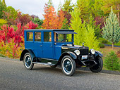 AUT 18 RK0783 01
1923 Columbia 5 Passenger Sedan Blue And Black 3/4 Front View On Pavement By Autumn Trees