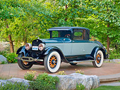 AUT 18 RK0809 01
1925 Lincoln Judkins Coupe Blue 3/4 Front View On Pavement By Trees