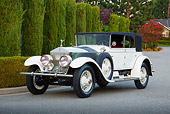 AUT 18 RK0818 01
1927 Rolls-Royce Phantom White 3/4 Front View On Pavement By Shrubs