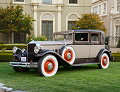 AUT 18 RK0822 01
1929 Franklin Roadster Brown And Beige 3/4 Side View On Grass By Mansion