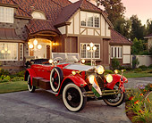 AUT 18 RK0015 21
1925 Rolls Royce Phantom I Red Convertible 3/4 Front View On Driveway By House