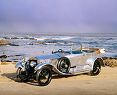 AUT 18 RK0049 05
1921 Rolls-Royce Silver Ghost Tourer 3/4 Front View On Sand By Ocean Waves
