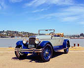 AUT 18 RK0083 02
1926 Locomobile Convertible Gray And Blue 3/4 Front View On Pavement By Water