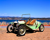 AUT 18 RK0280 09
1926 Ford Speedster Green Side 3/4 View On Dirt By Lake