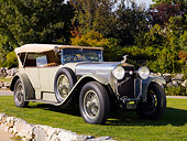 AUT 18 RK0295 01
1923 Hispano Suiza H6-B Touring Dual Windshield French Gray Front 3/4 View On Grass By Trees Stone Wall
