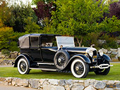 AUT 18 RK0314 01
1928 Lincoln L-Series Collapsible Cabriolet Black 3/4 Front View On Grass By Trees