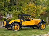 AUT 18 RK0320 01
1921 Paige Daytona Speedster Yellow 3/4 Rear View On Grass By Trees