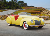 AUT 19 BK0007 01
1939 Coachcraft Mercury Roadster Cigarette Cream 3/4 Front View On Pavement By Beach