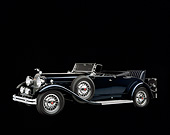 AUT 19 RK0083 02
1930 Packard 850 Roadster Blue 3/4 Side View Studio