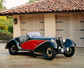 AUT 19 RK0238 03
1933 Alfa Romeo 2.3 230D 8C Convertible Black And Red 3/4 Front View On Driveway