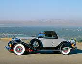 AUT 19 RK0246 14
1934 Auburn Model 1250 Gray 3/4 Front View On Pavement By Mountain