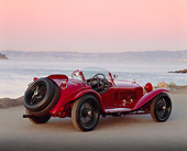 AUT 19 RK0259 08
1932 Alfa Romeo 2300 Touring Spider 8C Red 3/4 Rear View On Dirt By Ocean At Dusk