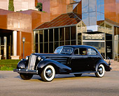AUT 19 RK0324 05
1934 Cadillac V-16 Aerodynamic Coupe Purple 3/4 Side View On Pavement By Museum
