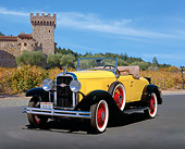 AUT 19 RK0461 01
1930 Oldsmobile Roadster Yellow 3/4 Front View On Pavement Blue Sky