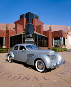 AUT 19 RK0474 02
1936 Cord Westchester Model 810 Silver Wide Angle 3/4 Front View In Front Of Museum