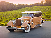 AUT 19 RK0740 01
1934 Packard Touring Super Eight Nutmeg 3/4 Front View On Pavement By Vineyard