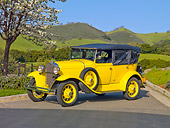 AUT 19 RK0768 01
1930 Ford Model A Phaeton STD Yellow 3/4 Side View On Pavement By Trees