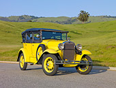 AUT 19 RK0770 01
1930 Ford Model A Phaeton STD Yellow 3/4 Front View On Pavement By Grassy Hills