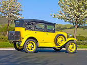 AUT 19 RK0771 01
1930 Ford Model A Phaeton STD Yellow 3/4 Rear View On Pavement By Trees