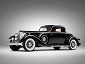 AUT 19 RK0786 01
1933 Packard Twelve Custom Dietrich Coupe Black 3/4 Side View On White Seamless