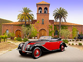 AUT 19 RK0805 01
1937 BMW Cabriolet Red And Black 3/4 Front View On Pavement By Brick Tower