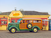 AUT 19 RK0833 01
1937 International Station Wagon D-2 1/2 Ton Woodie Green Profile View On Pavement By Diner