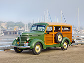 AUT 19 RK0834 01
1937 International Station Wagon D-2 1/2 Ton Woodie Green 3/4 Front View On Pavement By Harbor