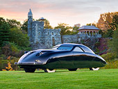 AUT 19 RK0863 01
1938 Phantom Corsair Black 3/4 Front View On Grass By Castle At Dusk