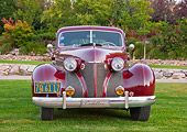 AUT 19 RK0872 01
1939 Cadillac Special Sedan Burgundy Head On View On Grass By Trees