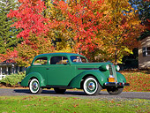 AUT 19 RK0890 01
1936 Pontiac Touring Sedan Green 3/4 Side View On Pavement By Autumn Trees