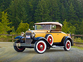 AUT 19 RK0900 01
1930 Ford Model A Yellow 3/4 Front View On Gravel By Grass Field And Trees