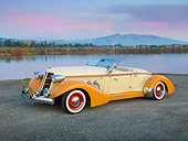 AUT 19 RK0904 01
1936 Auburn Speedster Tan And Brown 3/4 Front View On Gravel By Lake At Dusk