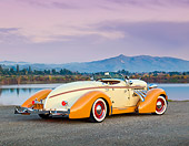 AUT 19 RK0907 01
1936 Auburn Speedster Tan And Brown 3/4 Rear View On Gravel By Lake At Dusk