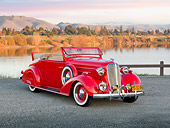 AUT 19 RK0915 01
1936 Chevrolet Roadster Red 3/4 Front View On Gravel By Lake