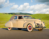 AUT 19 RK0923 01
1939 Lincoln Zephyr Convertible Cream 3/4 Front View On Pavement By Grassy Hills