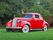 AUT 19 RK0952 01
1939 Packard 2/4-Passenger Coupe Red 3/4 Front View On Grass By Trees