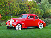 AUT 19 RK0953 01
1939 Packard 2/4-Passenger Coupe Red 3/4 Side View On Grass By Trees