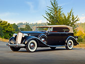 AUT 19 RK0971 01
1937 Packard 1507 Sport Phaeton Black 3/4 Side View On Pavement By Trees
