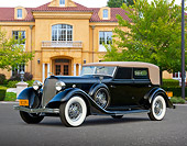 AUT 19 RK0975 01
1934 Lincoln K Dietrich Convertible Sedan Black 3/4 Front View On Pavement By Yellow House