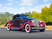 AUT 19 RK0978 01
1933 Lincoln KB Lebaron Convertible Coupe Black And Red 3/4 Front View On Pavement By Trees