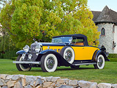 AUT 19 RK1012 01
1937 Cadillac 370A Roadster Yellow And Black 3/4 Front View On Grass By Trees And House
