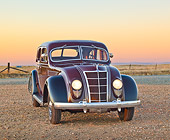 AUT 19 RK1023 01
1935 Chrysler C2 Airflow Imperial Maroon And Black 3/4 Front View On Gravel At Dusk