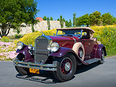 AUT 19 RK1031 01
1930 Pierce-Arrow Model B Two-Tone Maroon 3/4 Front View On Pavement By Wildflowers