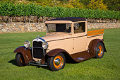 AUT 19 RK1042 01
1931 Ford Model A Beige 3/4 Front View On Grass By Vineyard