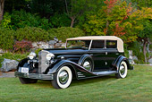 AUT 19 RK1051 01
1933 Cadillac V-16 All Weather Phaeton Fleetwood Black 3/4 Front View On Grass By Trees