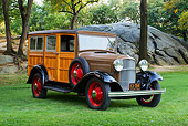 AUT 19 RK1068 01
1932 Ford Model B-150 Station Wagon Woodie 3/4 Front View On Grass By Trees