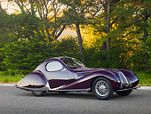 AUT 19 RK1069 01
1938 Talbot-Lago T150C SS Teardrop Coupe Purple 3/4 Side View On Pavement By Trees